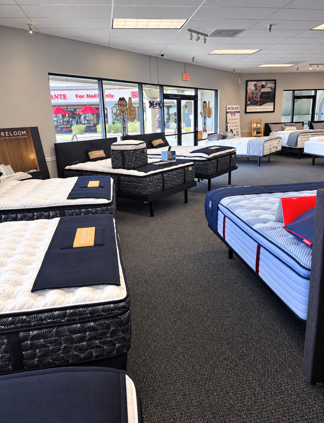 Luxury mattress showroom interior at Bed DRS with premium mattresses on display